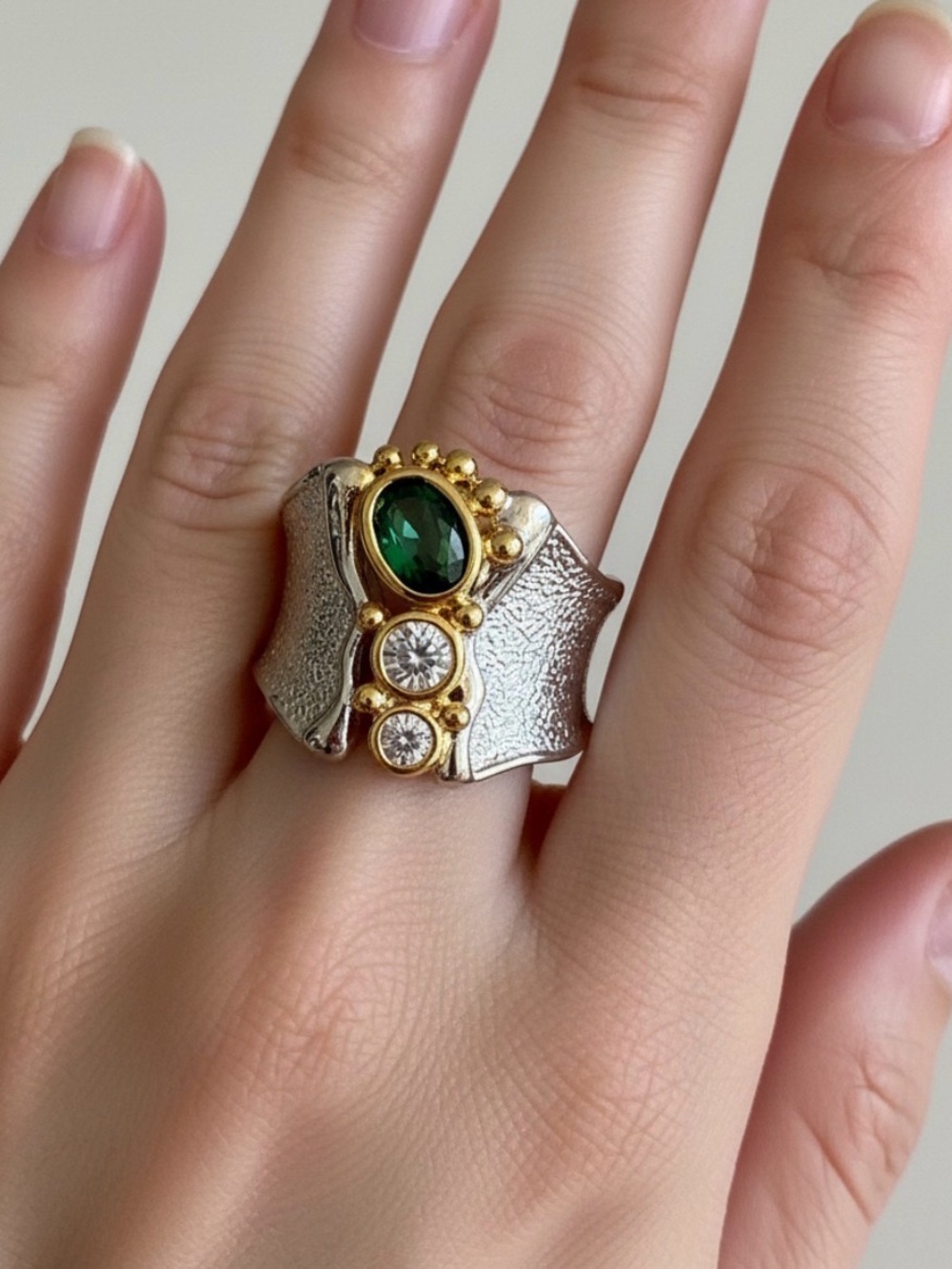 Silver-Tone Ring with Green and clear crystals.